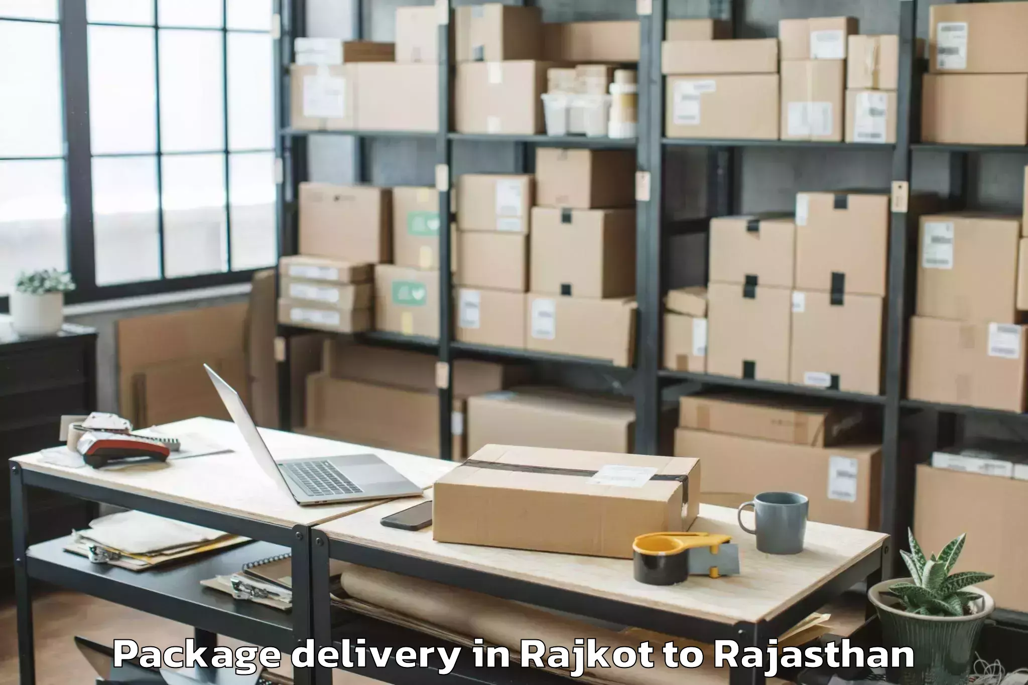 Leading Rajkot to Bari Dholpur Package Delivery Provider